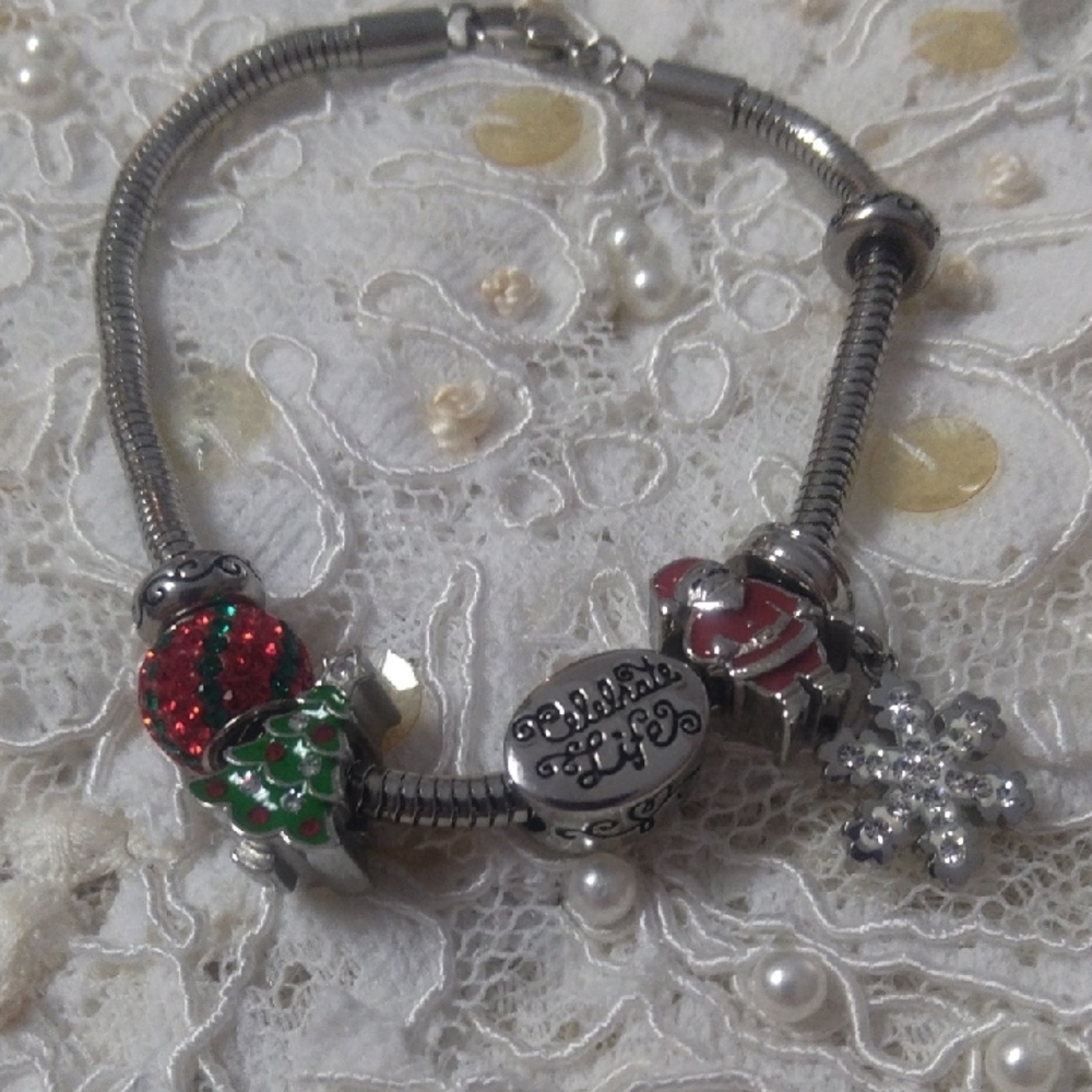 Silver and Red Charm Bracelet with Ornate Details